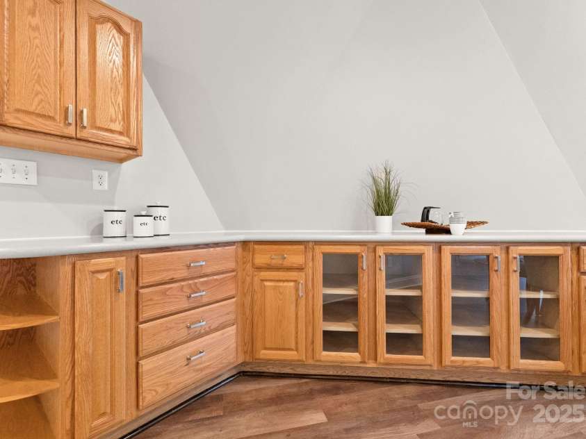 10200 Amsterdam Drive, Mount Pleasant, NC 28124.  MLS# CAR4213612, YatesRealty ID 31037. Built in buffet in the kitchen for plenty of storage and space