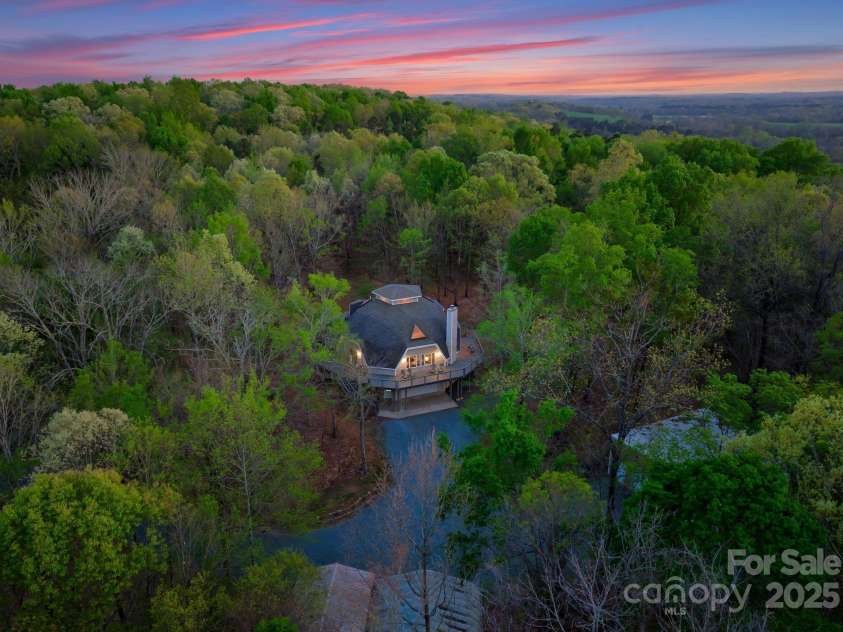 10200 Amsterdam Drive, Mount Pleasant, NC 28124.  MLS# CAR4213612, YatesRealty ID 31037. Enjoy just under 12.3 acres in Mount Pleasant- just 15 minutes from Concord!