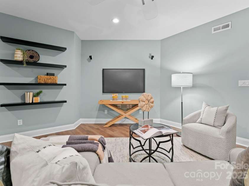 10200 Amsterdam Drive, Mount Pleasant, NC 28124.  MLS# CAR4213612, YatesRealty ID 31037. Entertainment area in the basement