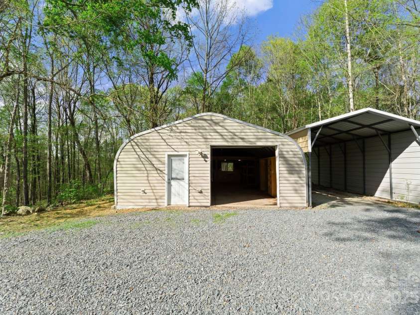 10200 Amsterdam Drive, Mount Pleasant, NC 28124.  MLS# CAR4213612, YatesRealty ID 31037. Fully powered shed/garage- used as a wood working workshop previously
