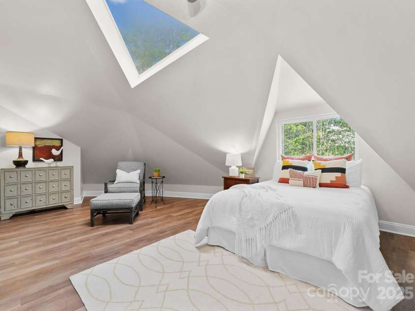 10200 Amsterdam Drive, Mount Pleasant, NC 28124.  MLS# CAR4213612, YatesRealty ID 31037. Guest bedroom on second level