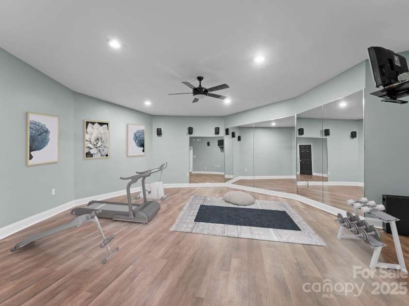 10200 Amsterdam Drive, Mount Pleasant, NC 28124.  MLS# CAR4213612, YatesRealty ID 31037. Gym or dance studio in the finished basement with additional walk in storage
