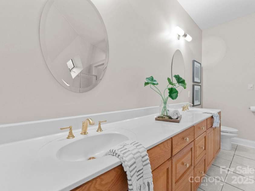 10200 Amsterdam Drive, Mount Pleasant, NC 28124.  MLS# CAR4213612, YatesRealty ID 31037. Primary bathroom with dual sinks