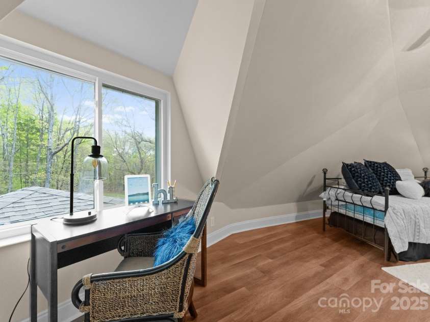 10200 Amsterdam Drive, Mount Pleasant, NC 28124.  MLS# CAR4213612, YatesRealty ID 31037. Second guest bedroom on second level with ample natural light and overlooking the property