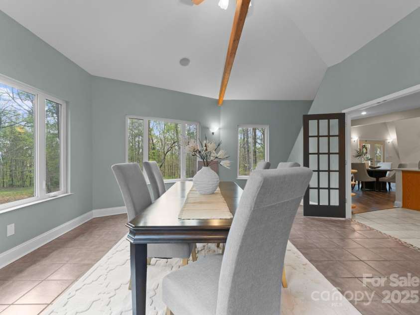 10200 Amsterdam Drive, Mount Pleasant, NC 28124.  MLS# CAR4213612, YatesRealty ID 31037. Solarium style dining room