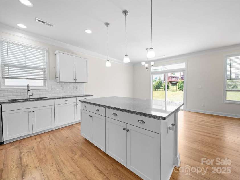 3042 Burnello Court, Iron Station, NC 28080.  MLS# CAR4244705, YatesRealty ID 31038. Kitchen & Dining area