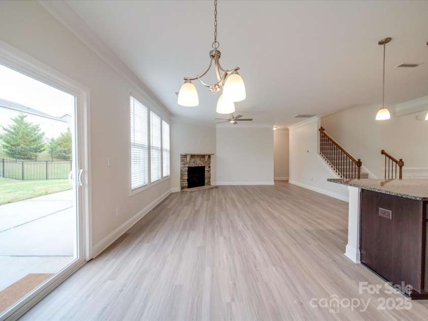 3022 Burnello Court, Iron Station, NC 28080.  MLS# CAR4256845, YatesRealty ID 31040. Dining Area & Living Room