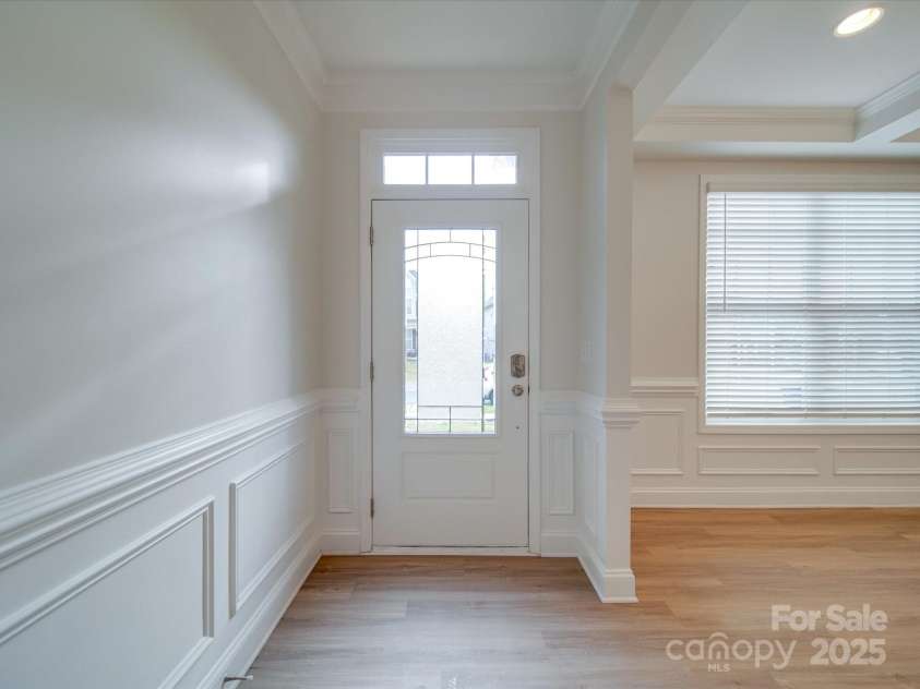 3022 Burnello Court, Iron Station, NC 28080.  MLS# CAR4256845, YatesRealty ID 31040. Front door into the Dining Room