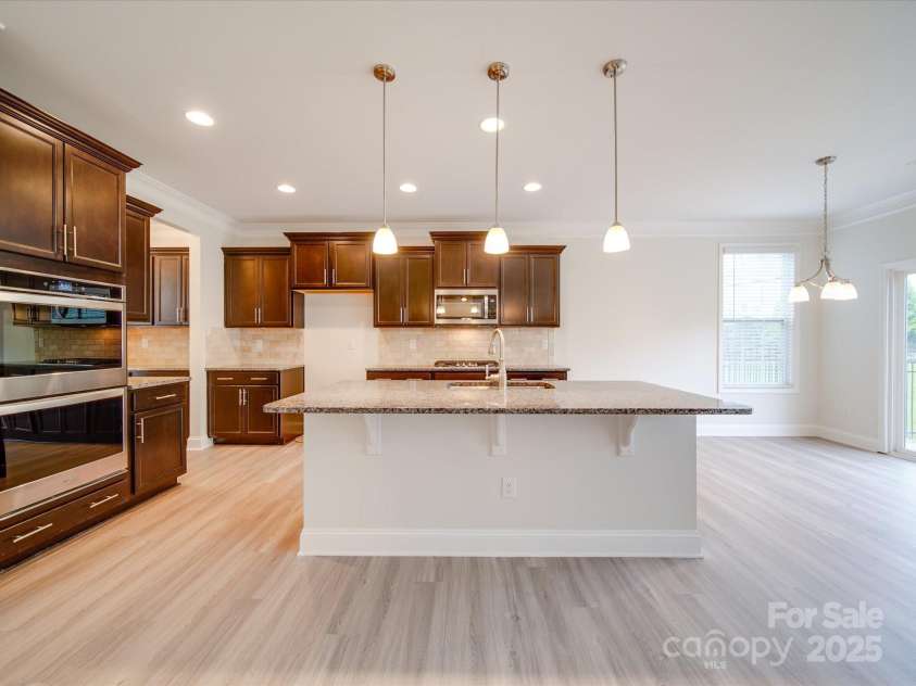 3022 Burnello Court, Iron Station, NC 28080.  MLS# CAR4256845, YatesRealty ID 31040. Kitchen, Dining Area