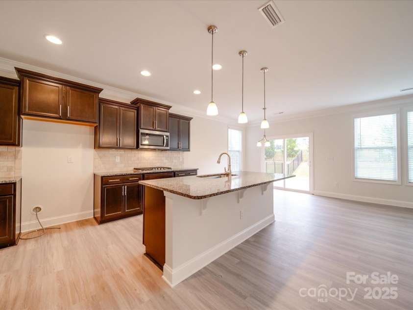 3022 Burnello Court, Iron Station, NC 28080.  MLS# CAR4256845, YatesRealty ID 31040. Kitchen, Dining Area