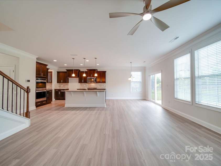 3022 Burnello Court, Iron Station, NC 28080.  MLS# CAR4256845, YatesRealty ID 31040. Kitchen, Dining Area & Living Room