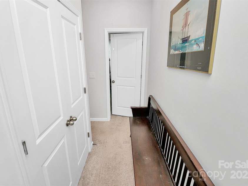 713 Henderson Valley Way, Belmont, NC 28012.  MLS# CAR4277961, YatesRealty ID 31050. Upstairs hallway with plenty of storage