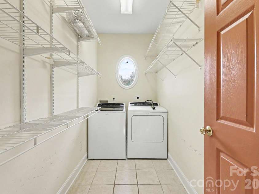 411 Northbridge Drive, High Point, NC 27265.  MLS# CAR4383000, YatesRealty ID 31051. Laundry room