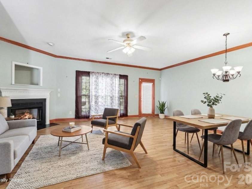 411 Northbridge Drive, High Point, NC 27265.  MLS# CAR4383000, YatesRealty ID 31051. Living room virtually staged