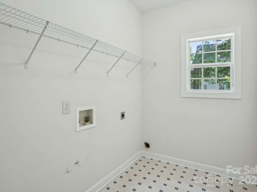 8020 Garnkirk Drive, Huntersville, NC 28078.  MLS# CAR4279896, YatesRealty ID 31053. Main Floor Laundry Room