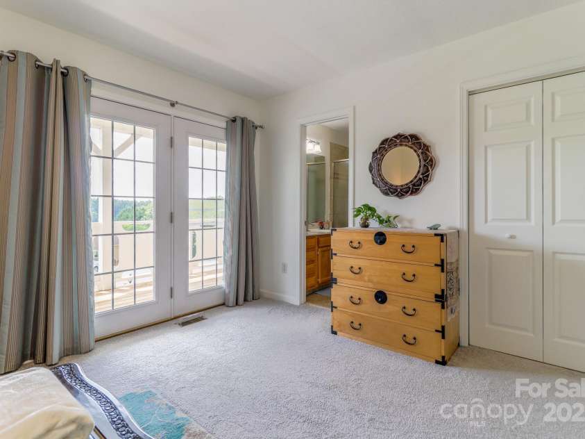 142 Ridge Brook Drive, Weaverville, NC 28787.  MLS# CAR4280040, YatesRealty ID 31054. Doors to Balcony