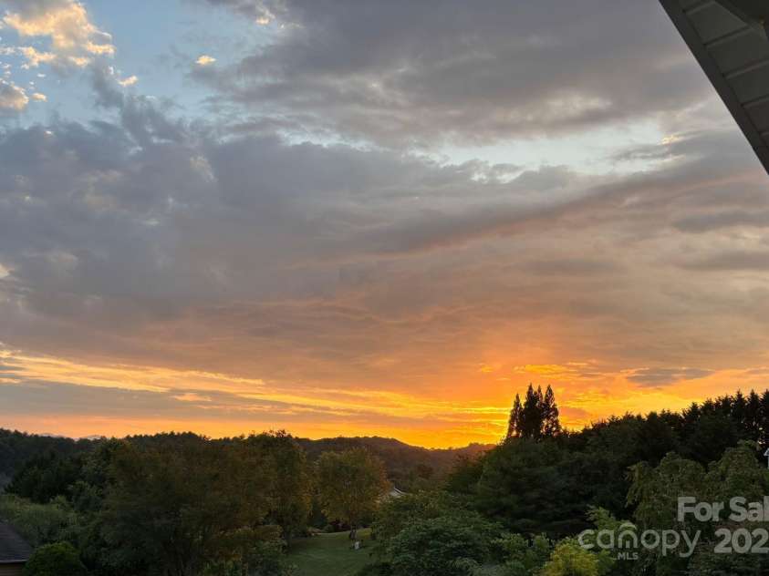 142 Ridge Brook Drive, Weaverville, NC 28787.  MLS# CAR4280040, YatesRealty ID 31054. Sunset Off Balcony