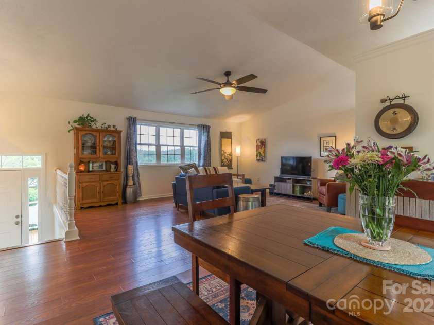 142 Ridge Brook Drive, Weaverville, NC 28787.  MLS# CAR4332710, YatesRealty ID 31054. Dining to Living Room