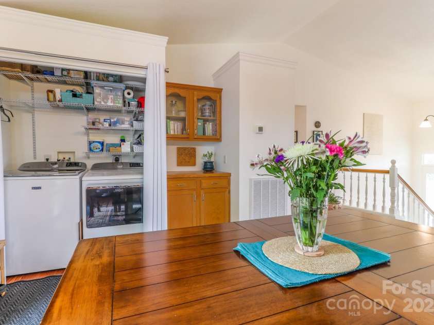 142 Ridge Brook Drive, Weaverville, NC 28787.  MLS# CAR4332710, YatesRealty ID 31054. Laundry off Dining