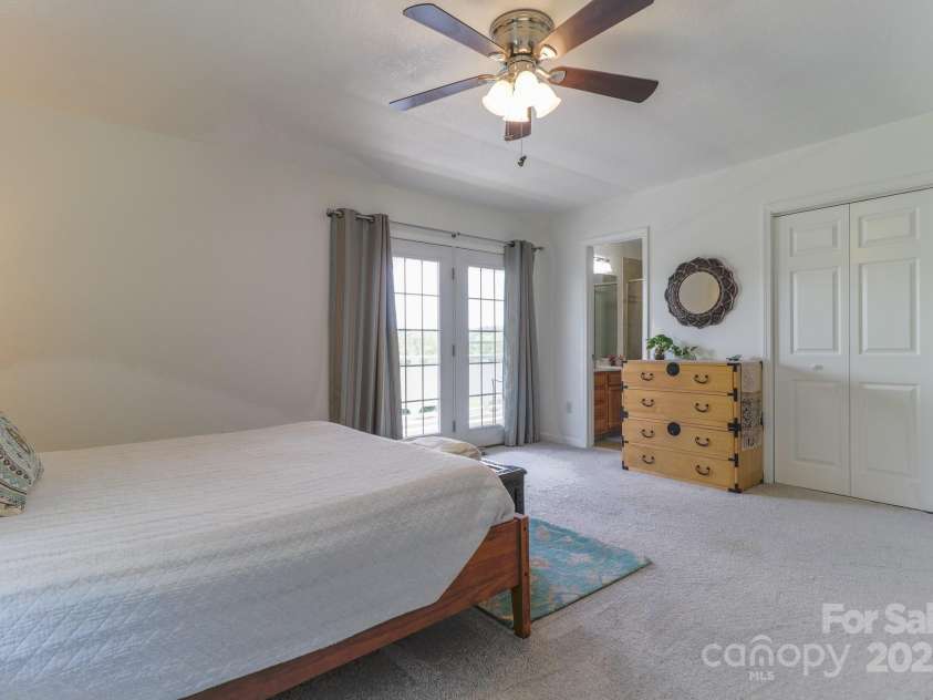 142 Ridge Brook Drive, Weaverville, NC 28787.  MLS# CAR4332710, YatesRealty ID 31054. Primary with En Suite and Balcony