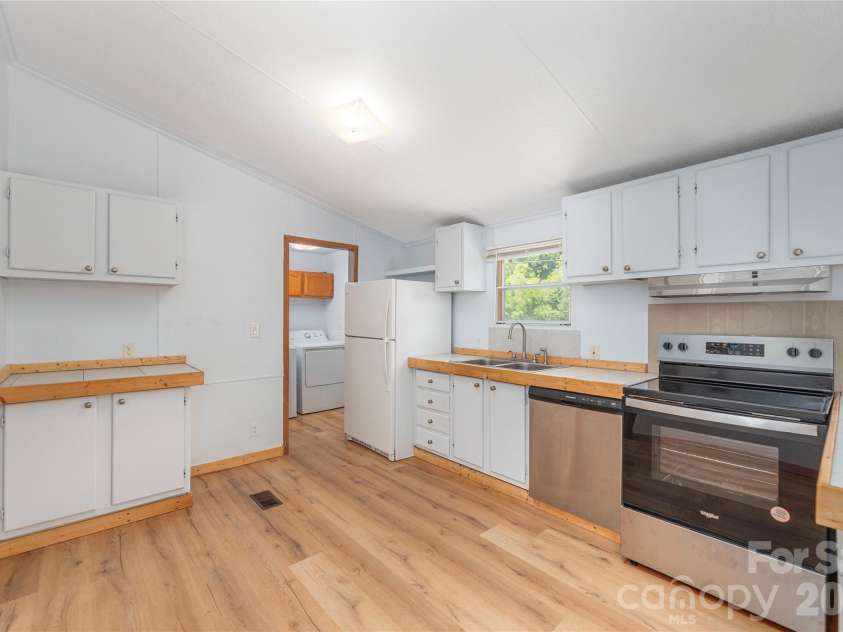 1458 Old Balsam Road, Waynesville, NC 28786.  MLS# CAR4392696, YatesRealty ID 31054. 