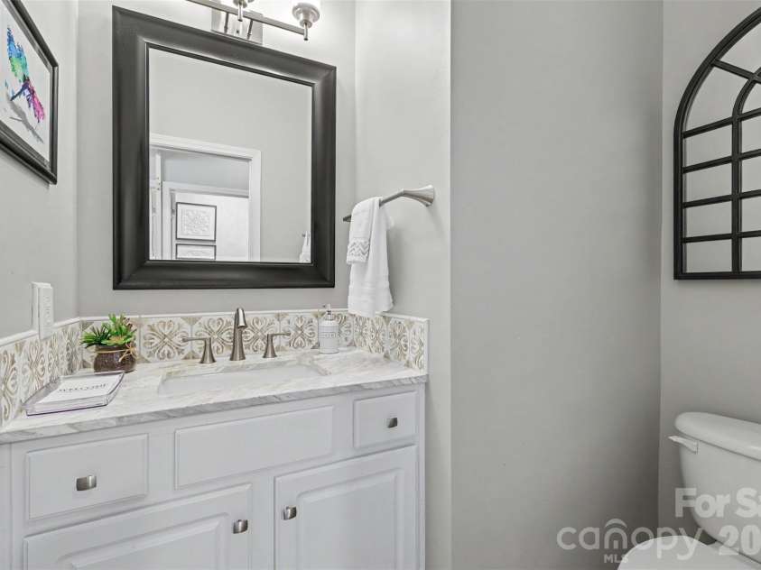 2517 Coltsgate Road, Waxhaw, NC 28173.  MLS# CAR4415991, YatesRealty ID 31055. Hall half-bath on main