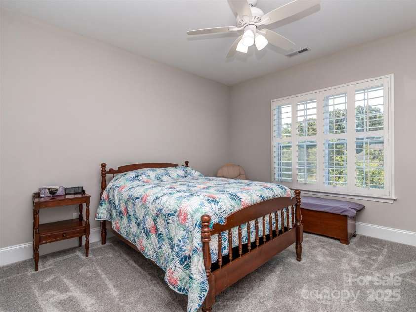 1011 Golden Bell Drive, Marvin, NC 28173.  MLS# CAR4270289, YatesRealty ID 31056. 2nd Floor Guest Suite with Plantation Blinds & a full guest bath.