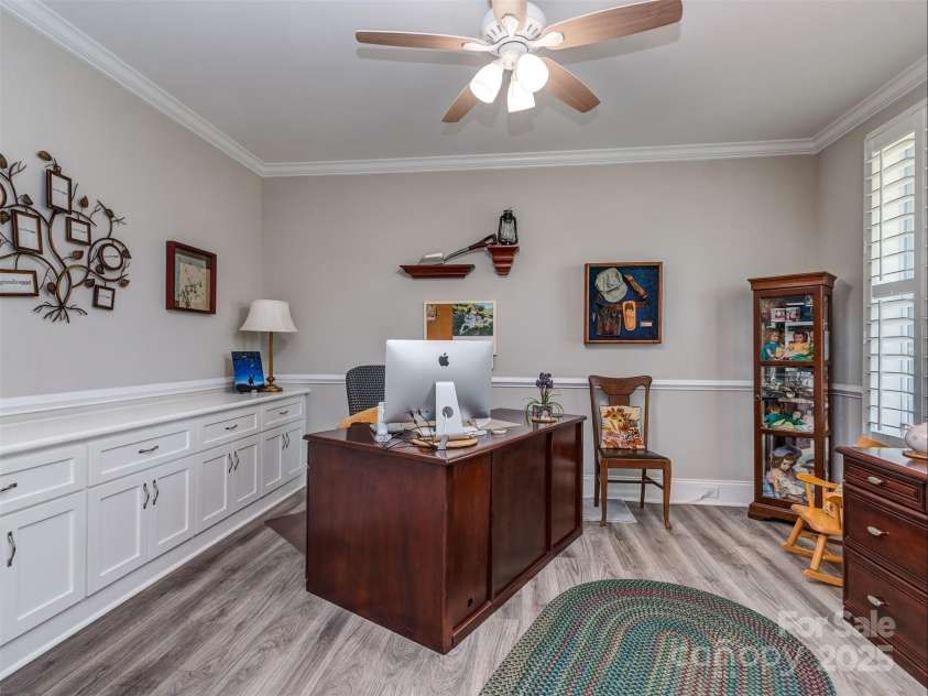 1011 Golden Bell Drive, Marvin, NC 28173.  MLS# CAR4270289, YatesRealty ID 31056. Main Floor Office with custom built-in cabinets, chair rail, crown molding, & plantation blinds