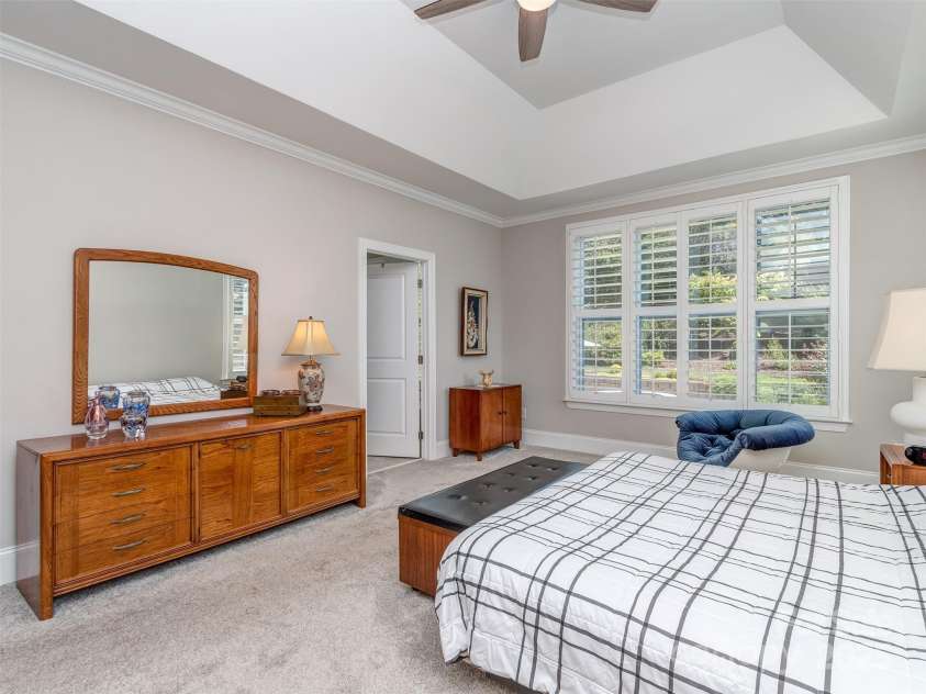 1011 Golden Bell Drive, Marvin, NC 28173.  MLS# CAR4270289, YatesRealty ID 31056. Main Floor Primary Suite with Trey Ceiling, Plantation Blinds, & oversized primary bath/closet.