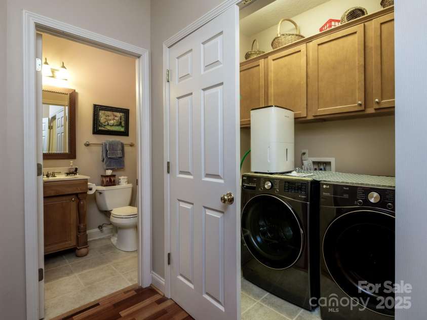 877 Soquili Drive, Brevard, NC 28712.  MLS# CAR4282524, YatesRealty ID 31057. Centrally located laundry closet is perfectly. situated.