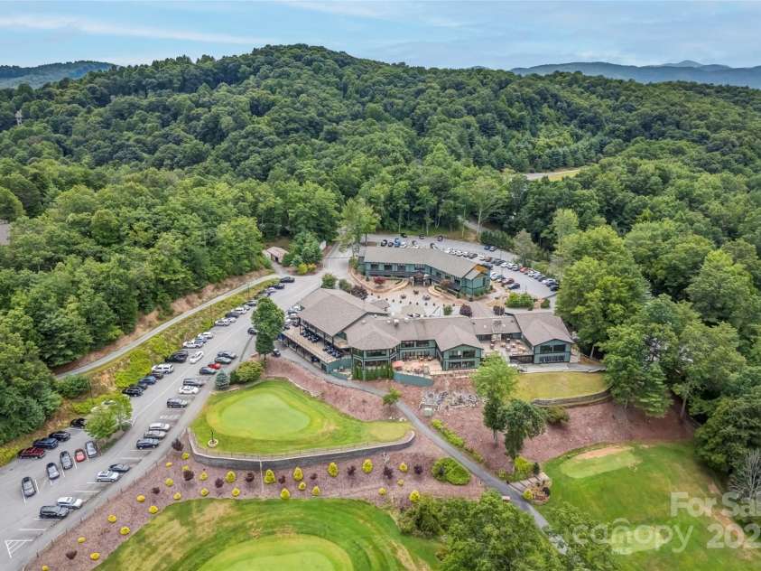 877 Soquili Drive, Brevard, NC 28712.  MLS# CAR4282524, YatesRealty ID 31057. Connestee Falls Driving Range