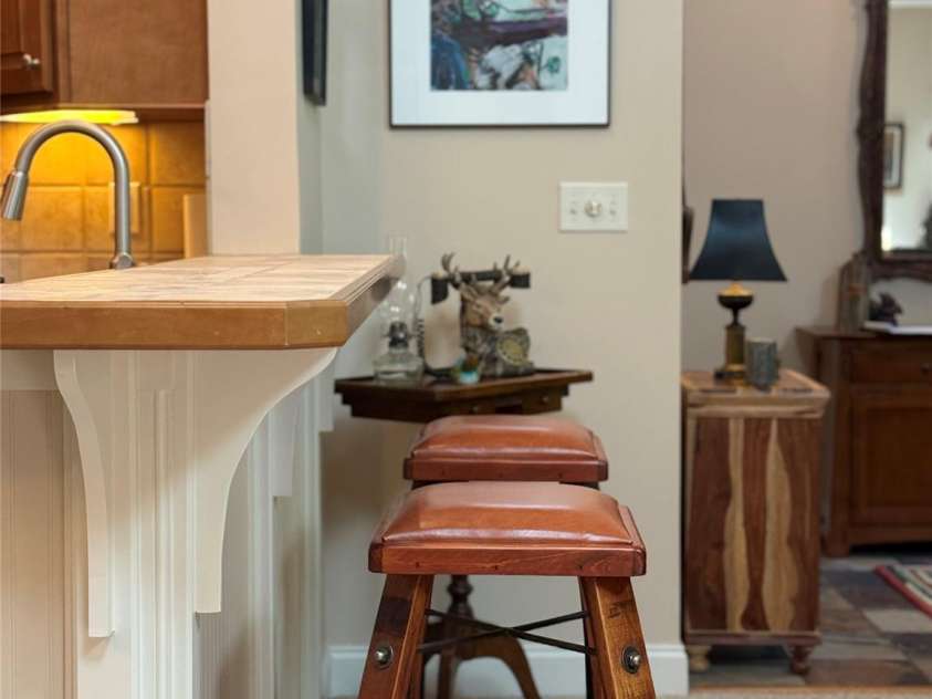 877 Soquili Drive, Brevard, NC 28712.  MLS# CAR4282524, YatesRealty ID 31057. Island seating.