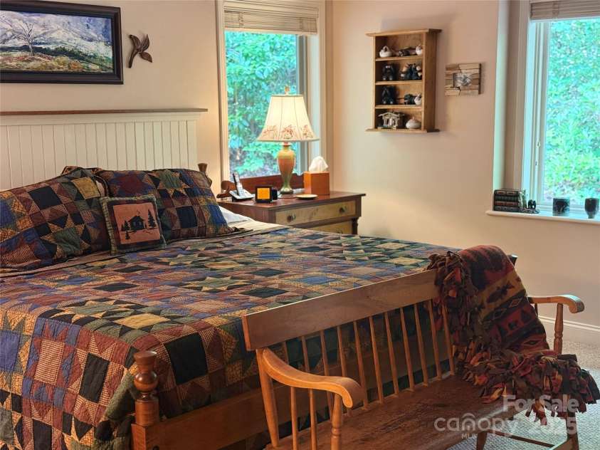 877 Soquili Drive, Brevard, NC 28712.  MLS# CAR4282524, YatesRealty ID 31057. Large primary bedroom.