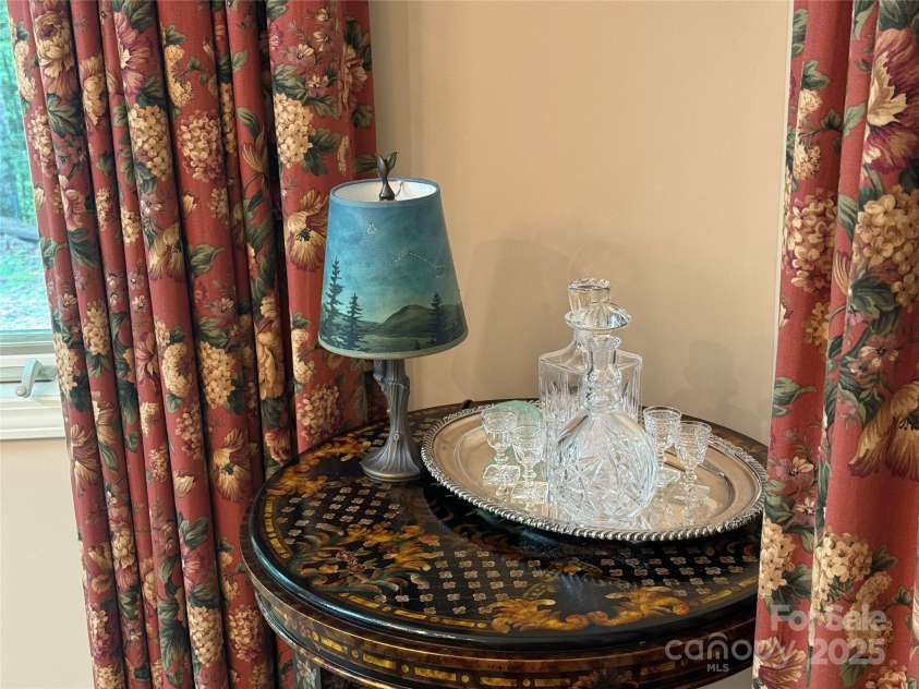 877 Soquili Drive, Brevard, NC 28712.  MLS# CAR4282524, YatesRealty ID 31057. Stunning drapes throughout that convey.