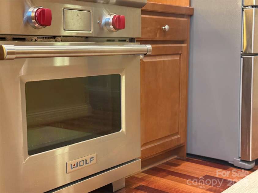 877 Soquili Drive, Brevard, NC 28712.  MLS# CAR4282524, YatesRealty ID 31057. Wolf oven and new appliances throughout.