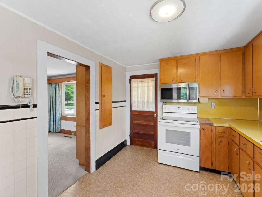 1230 Dana Road, Hendersonville, NC 28792.  MLS# CAR4392135, YatesRealty ID 31064. Kitchen alternative view