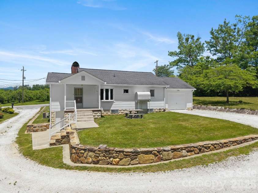 1230 Dana Road, Hendersonville, NC 28792.  MLS# CAR4392135, YatesRealty ID 31064. Rear View