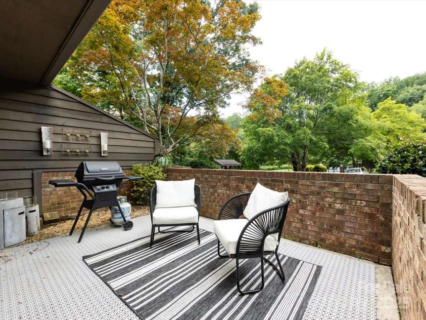 3508 Colony Crossing Drive, Charlotte, NC 28226.  MLS# CAR4279555, YatesRealty ID 31072. Brick surround patio just off the living area