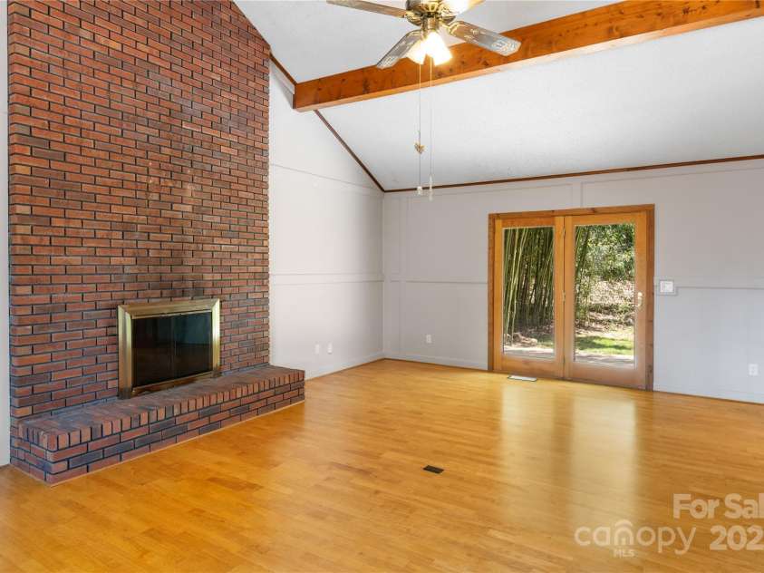 15 Elmwood Lane, Asheville, NC 28803.  MLS# CAR4231161, YatesRealty ID 31074. Large enough to accommodate an open living area with dining area by French doors to backyard