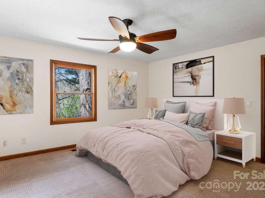 15 Elmwood Lane, Asheville, NC 28803.  MLS# CAR4231161, YatesRealty ID 31074. Main level primary bedroom; virtually staged