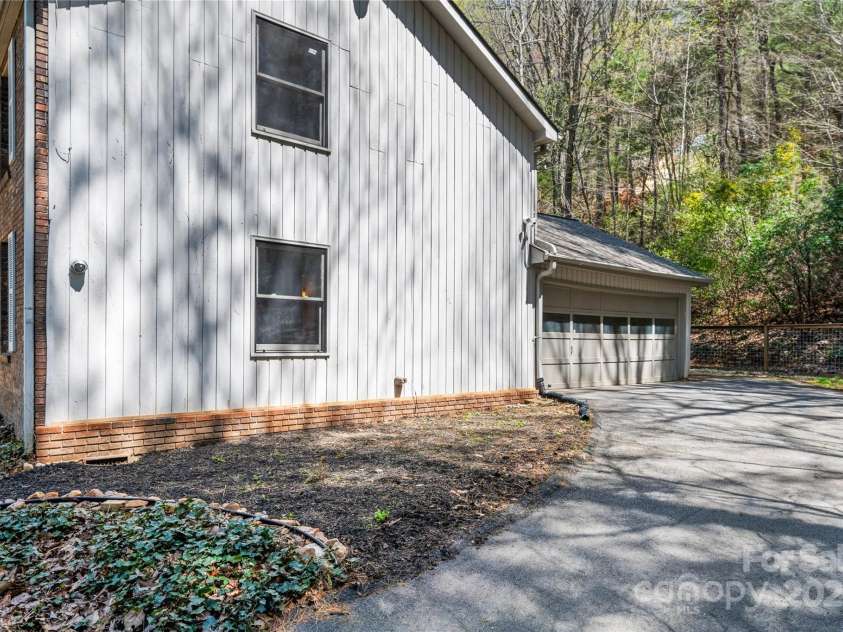 15 Elmwood Lane, Asheville, NC 28803.  MLS# CAR4231161, YatesRealty ID 31074. Park in garage and walk through laundry room to kitchen...easy with groceries!