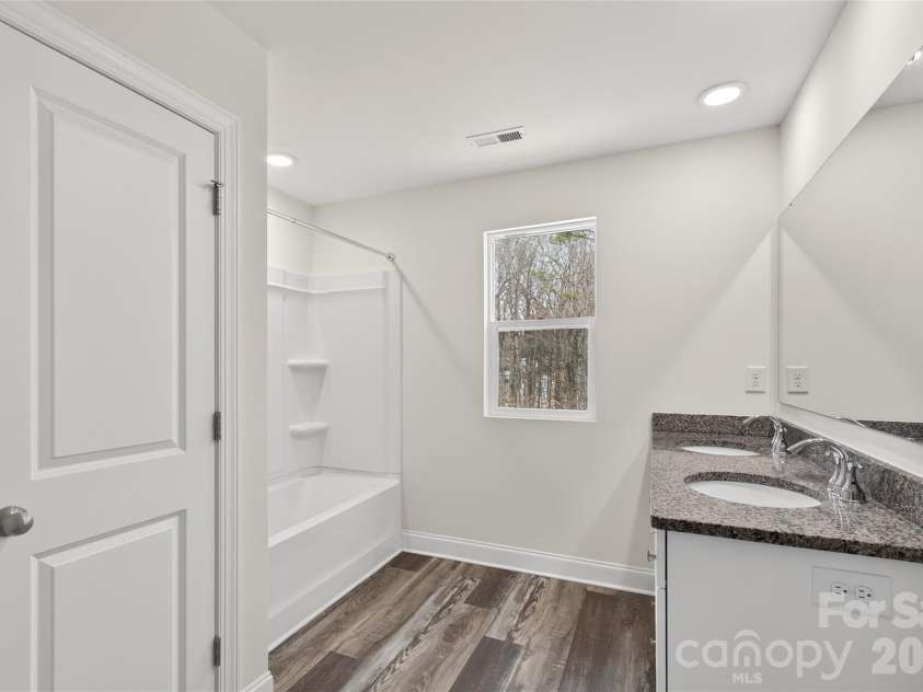 7308 Rothmore Street, Charlotte, NC 28215.  MLS# CAR4340834, YatesRealty ID 31075. Full bath upstairs 