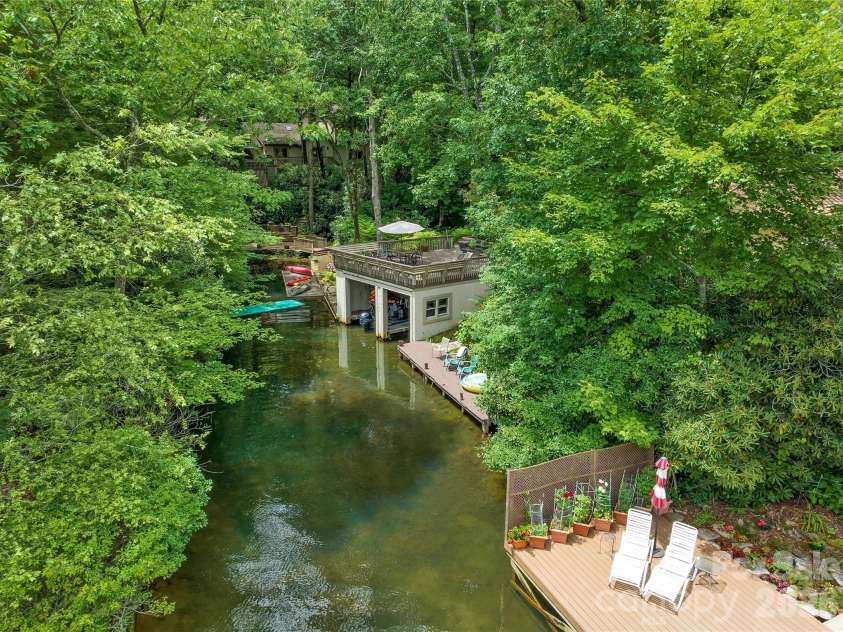562 West Club Boulevard, Lake Toxaway, NC 28747.  MLS# CAR4349047, YatesRealty ID 3108. 