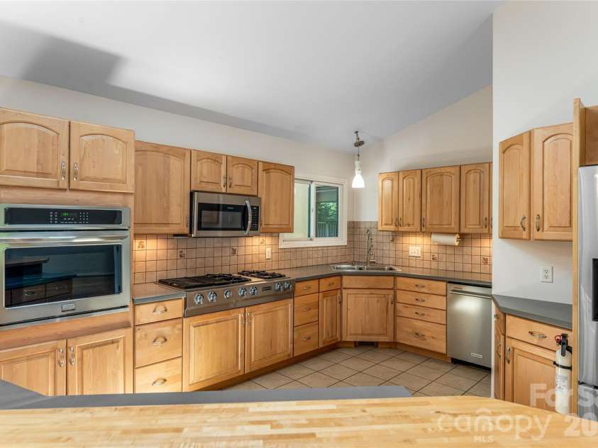 649 Rickel Drive, Hendersonville, NC 28739.  MLS# CAR4230611, YatesRealty ID 31080. 