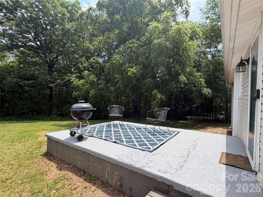 68 Doc Stokes Drive, Taylorsville, NC 28681.  MLS# CAR4393235, YatesRealty ID 31082. Back yard, back patio