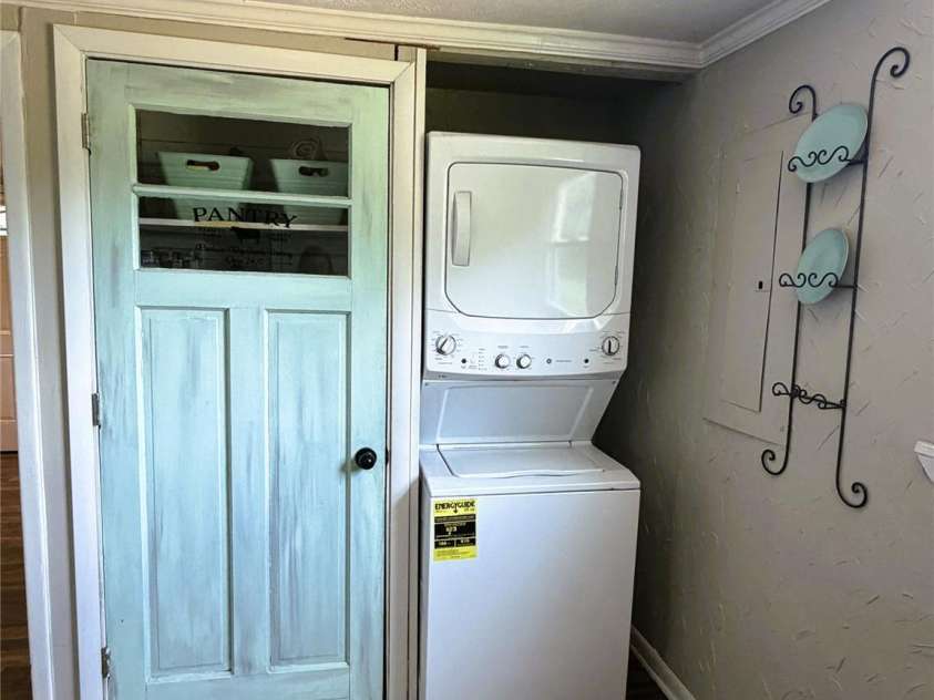 68 Doc Stokes Drive, Taylorsville, NC 28681.  MLS# CAR4393235, YatesRealty ID 31082. Pantry and laundry closet