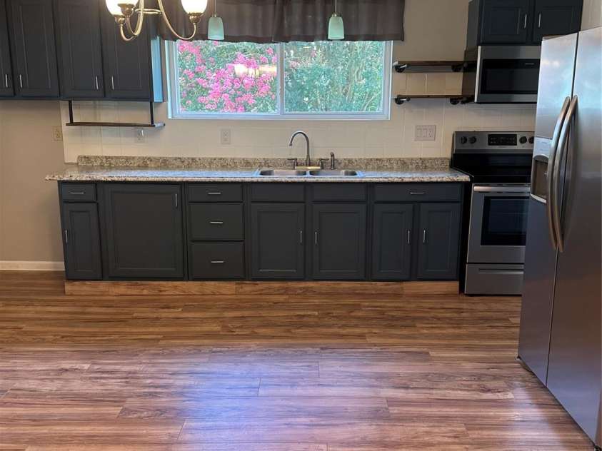 1208 North Davis Avenue, Newton, NC 28658.  MLS# CAR4283264, YatesRealty ID 31083. Large kitchen 13'x16' New cabinets