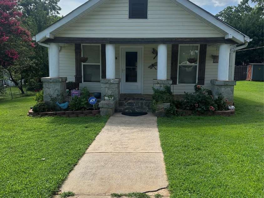 1208 North Davis Avenue, Newton, NC 28658.  MLS# CAR4283264, YatesRealty ID 31083. Side walk to front door