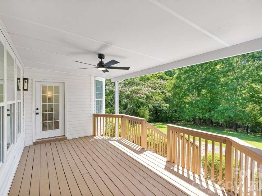 14724 Bridle Trace Lane, Pineville, NC 28134.  MLS# CAR4389602, YatesRealty ID 31084. Covered Deck