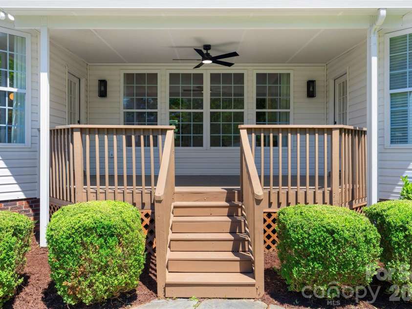 14724 Bridle Trace Lane, Pineville, NC 28134.  MLS# CAR4389602, YatesRealty ID 31084. Covered Deck